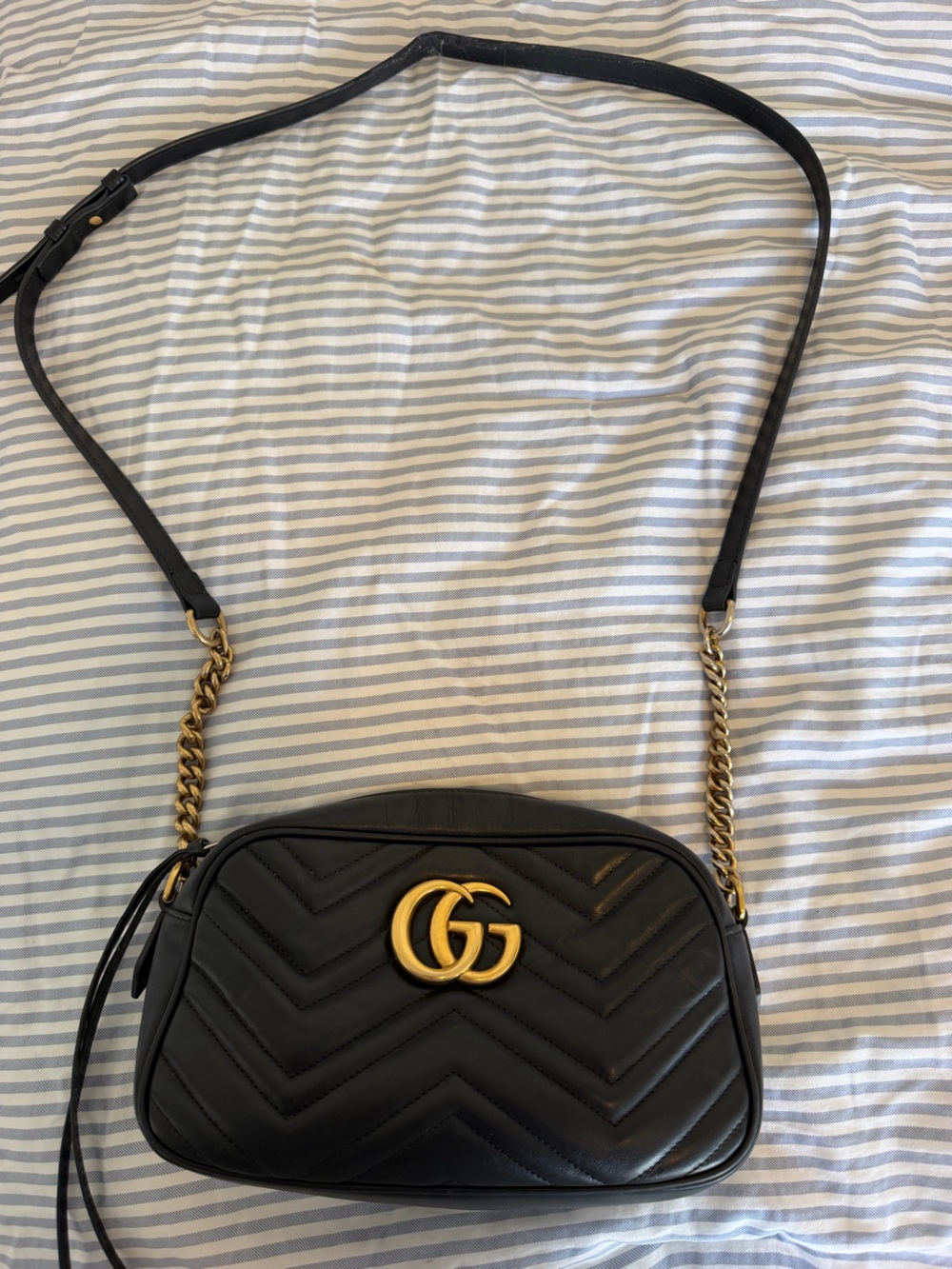 Black Gucci GG Marmont Matelasse small camera bag